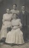 Cooke siblings:  Ida, Etta, Jimmy & Jean sitting
