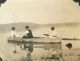 Hill, Stephen & Ida boating on the Muskrat behind their farm